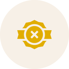 Yellow badge with an X symbol